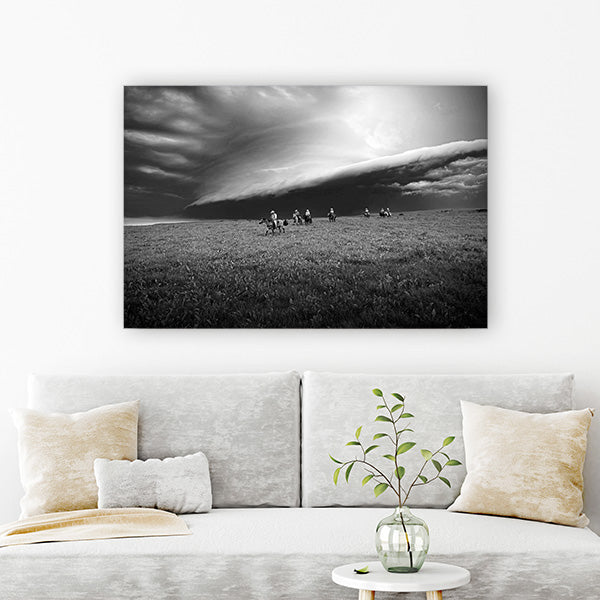 Storm Clouds on the Prairie - Horseback Cowboy Photo Canvas print by artist Garrett Osgood