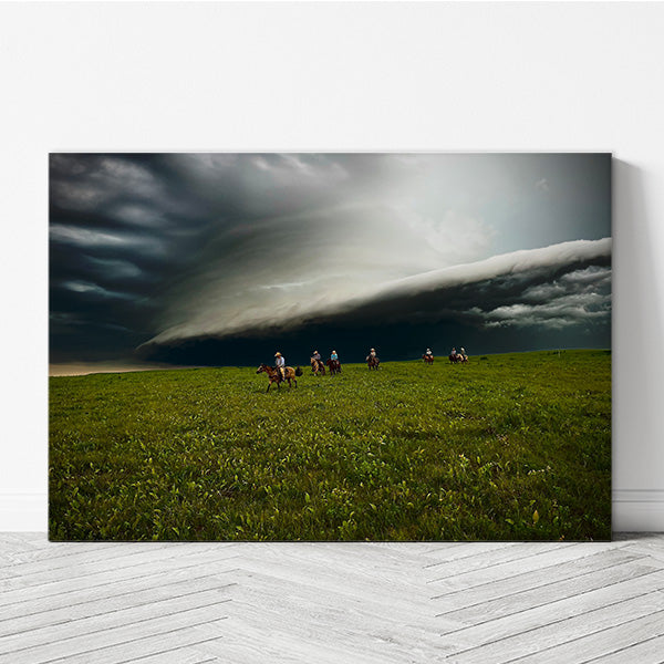 Storm Clouds on the Prairie - Horseback Cowboy Photo Canvas print by artist Garrett Osgood