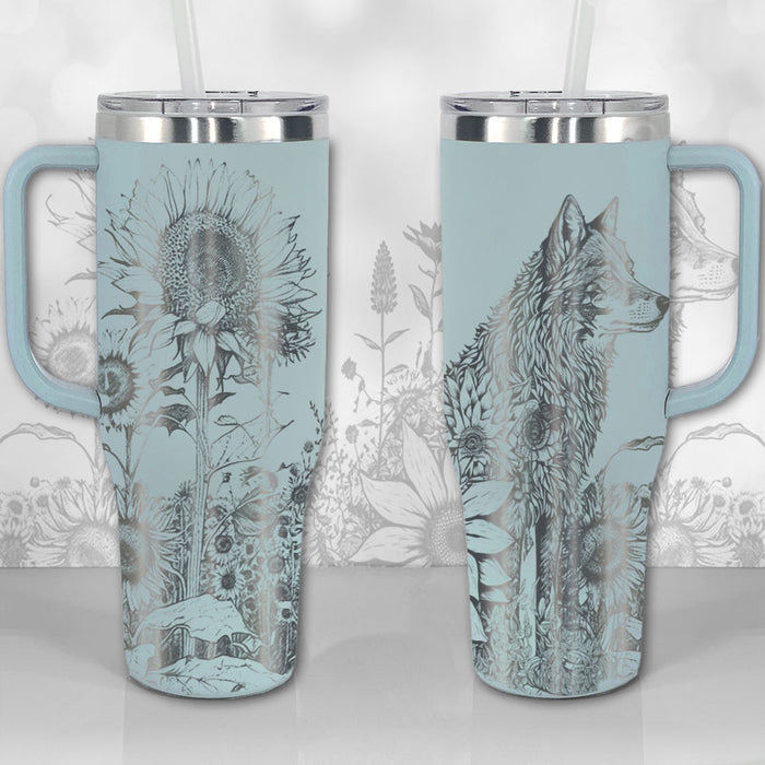 https://wichitagiftco.com/cdn/shop/products/40oz-tumbler-with-handle-sunflower-with-wolf-thirst-quencher-lid-insulated-travel-mug-seaglass-eucalyptus_700x700.jpg?v=1677410499
