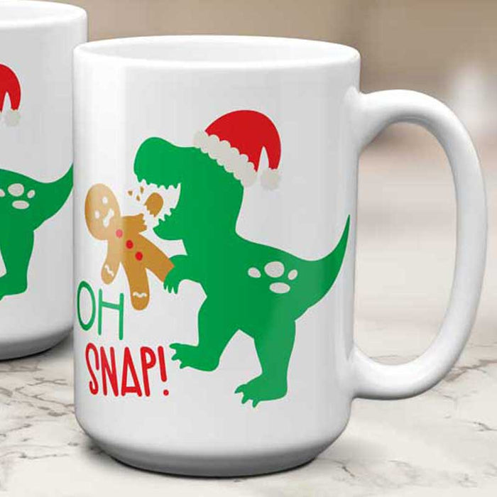Everyone's favorite Christmas dinosaur, the T-Rex, is getting into mischief and making a ginger snap out of his gingerbread friend. What a delicious and harmless way to be a little naughty this holiday for the little ones! This cute kids mug is a fun way to leave milk for Santa this year.